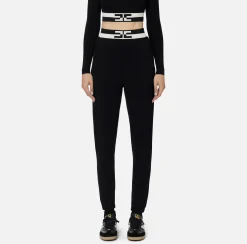 Pantalone jogger in viscosa con bande logo