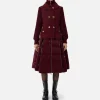 Piumino in nylon e panno con gonna a ruota