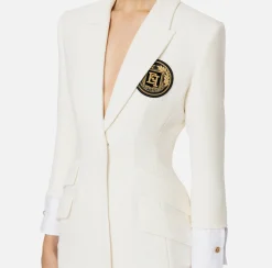 Robe manteau in tweed laminato con patch logo