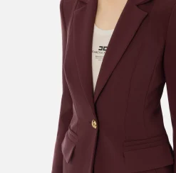 Tailleur in crêpe stretch con giacca sfiancata e pantalone dritto