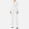 Tailleur in doppio crêpe stretch con giacca sciallata e pantalone a palazzo