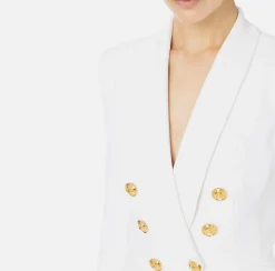 Tailleur in doppio crêpe stretch con giacca sciallata e pantalone a palazzo