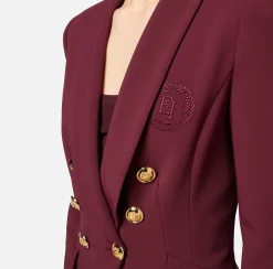 Tailleur in doppio crêpe stretch con giacca sciallata e pantalone a palazzo