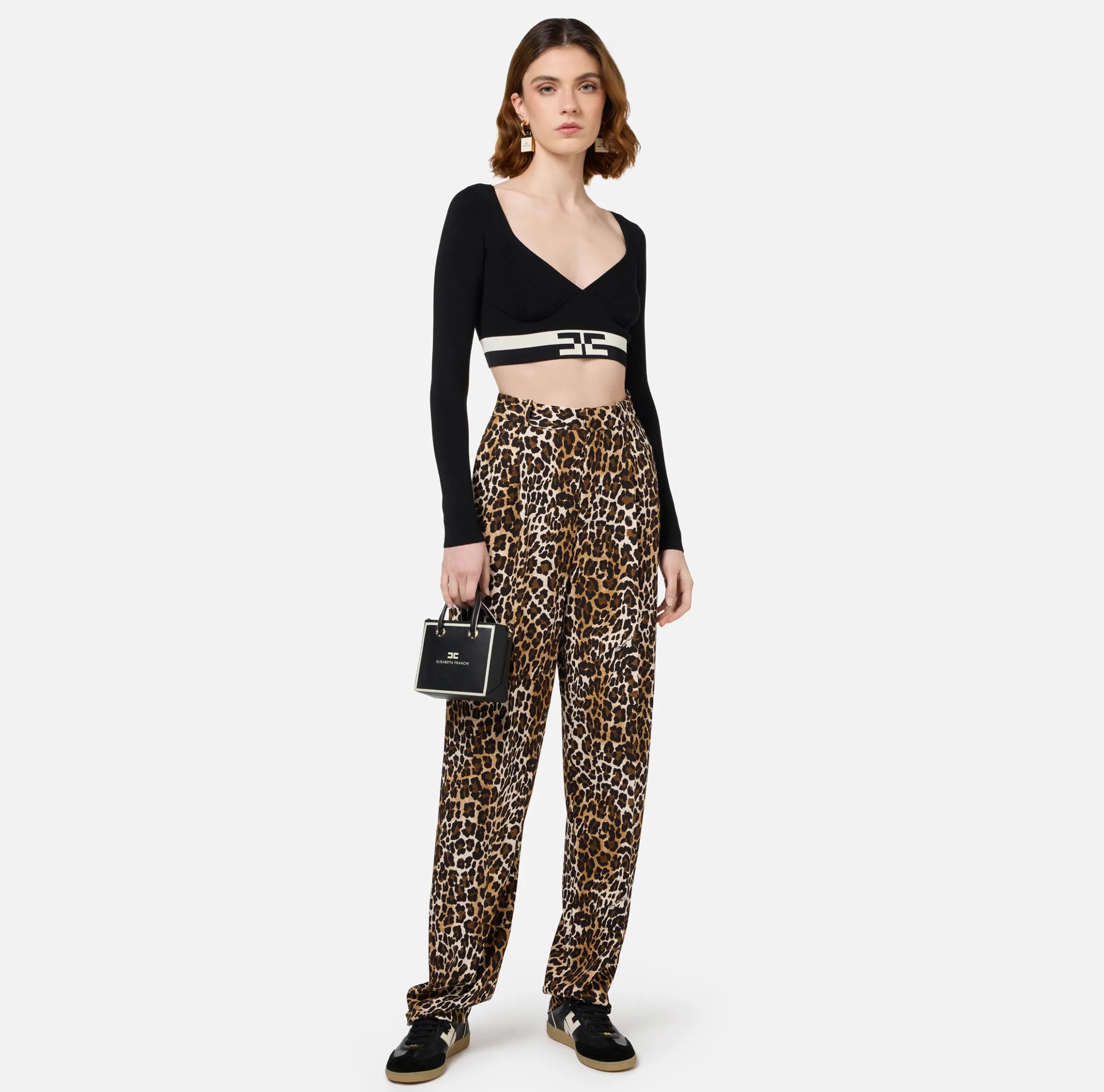 Top cropped in viscosa con bande logo