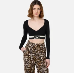 Top cropped in viscosa con bande logo