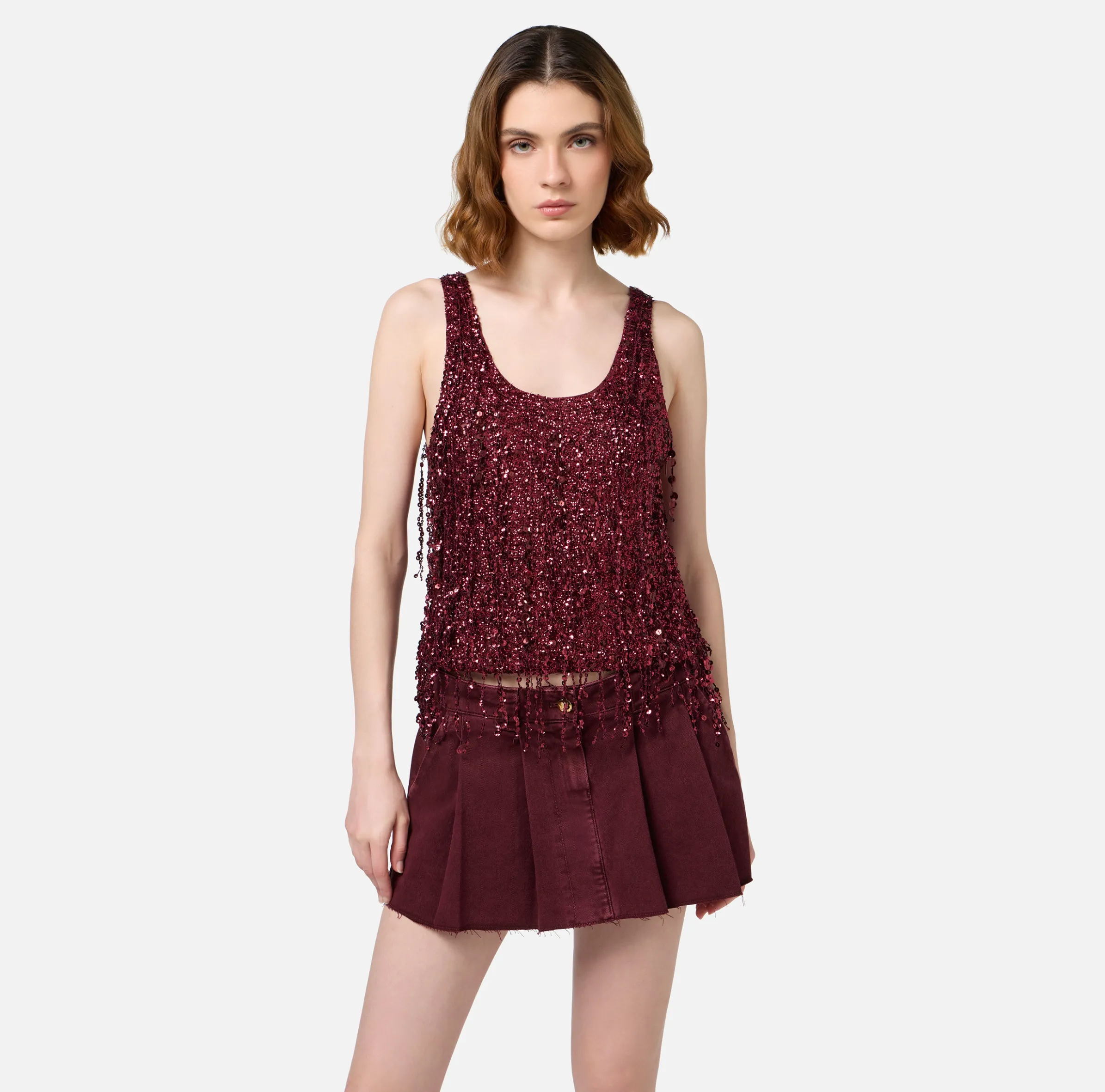 Top in tulle ricamato con frange di paillettes