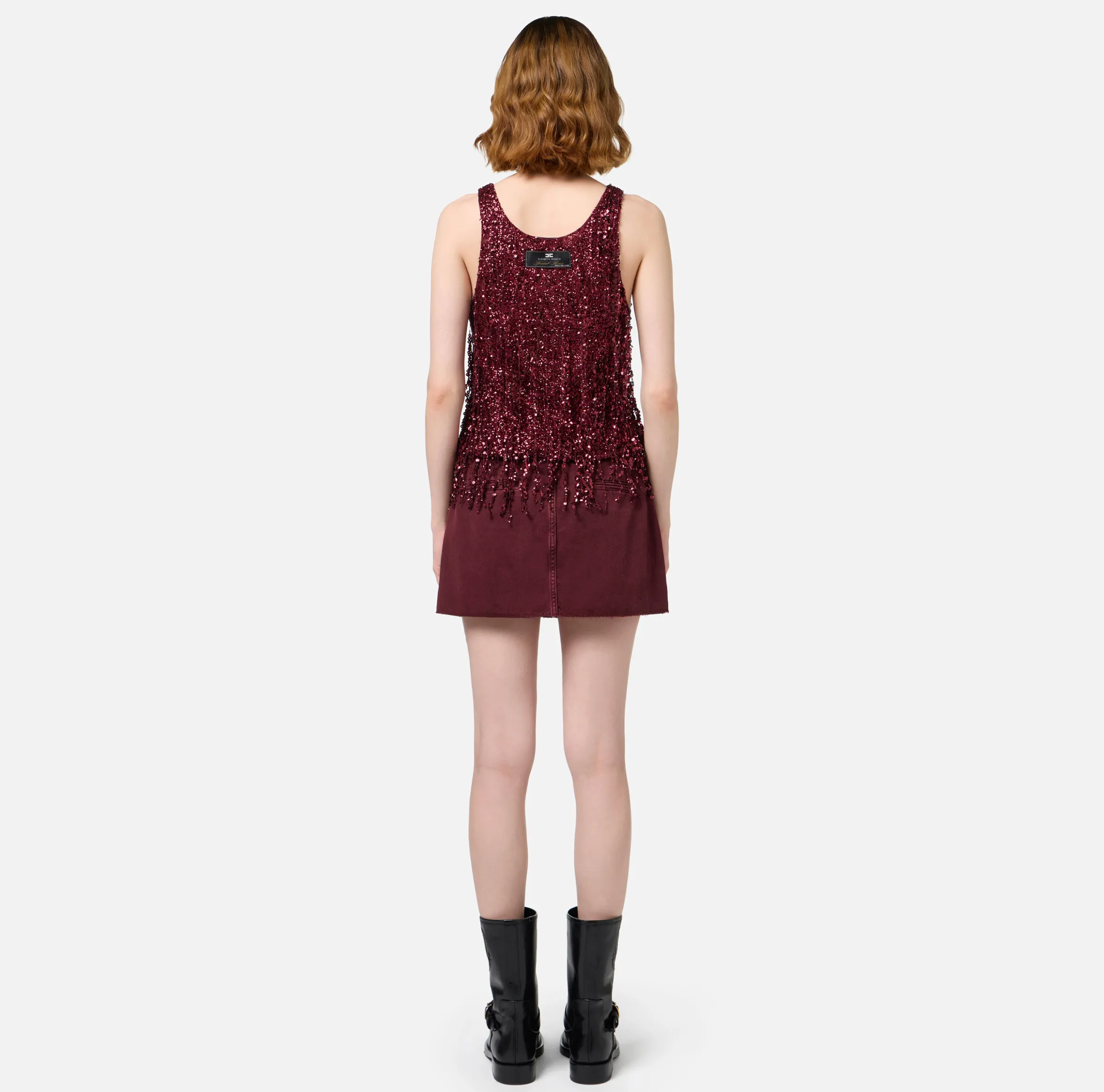 Top in tulle ricamato con frange di paillettes