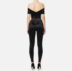 Tuta bustier in lycra con cintura