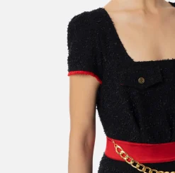 Tuta corta in tweed con tasche