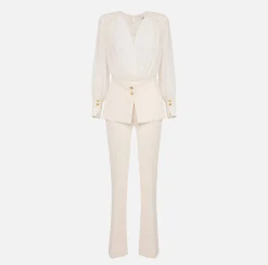 Tuta in crêpe con blusa in georgette e baschina