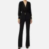 Tuta in crêpe con blusa in georgette e baschina