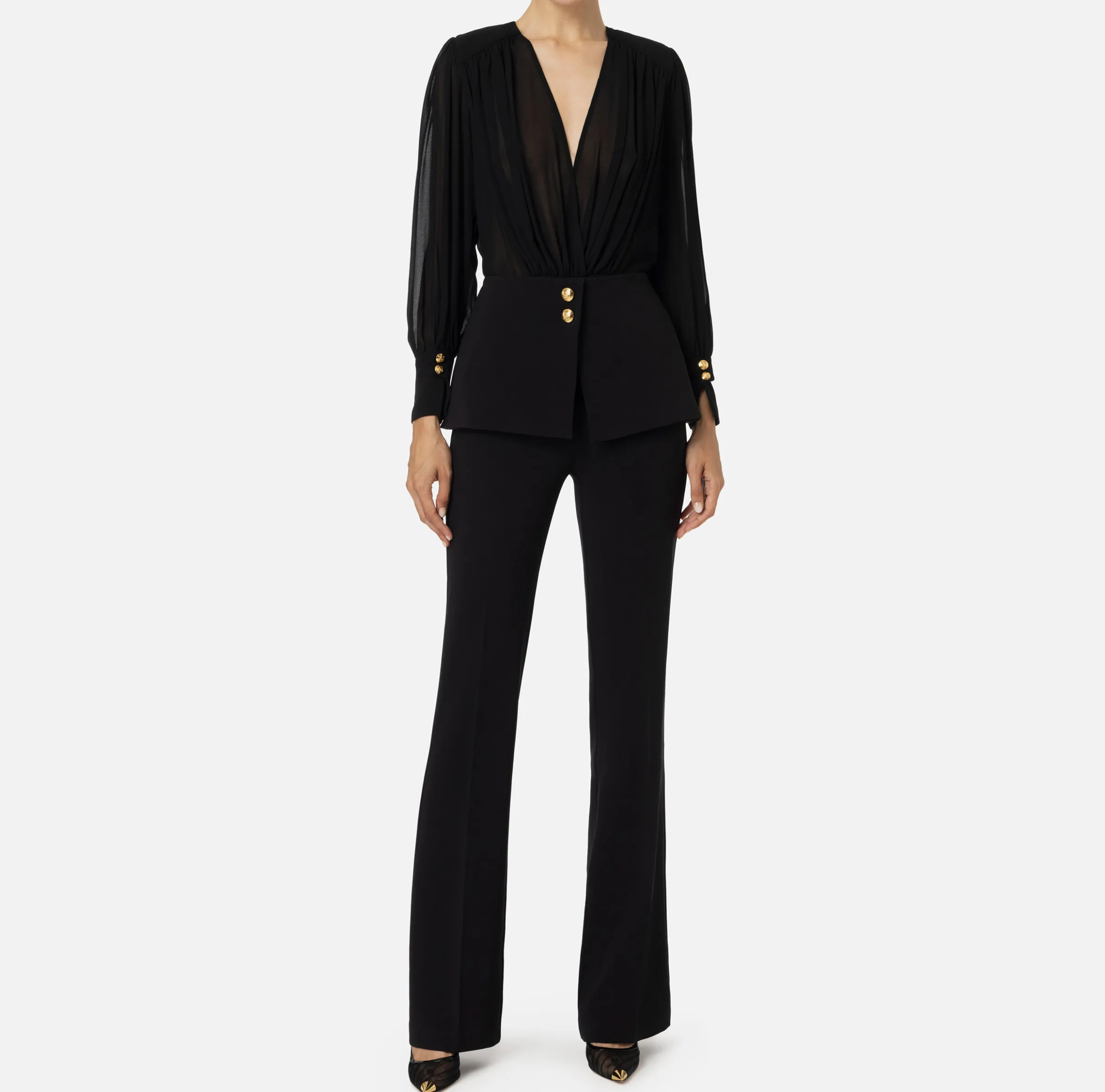 Tuta in crêpe con blusa in georgette e baschina
