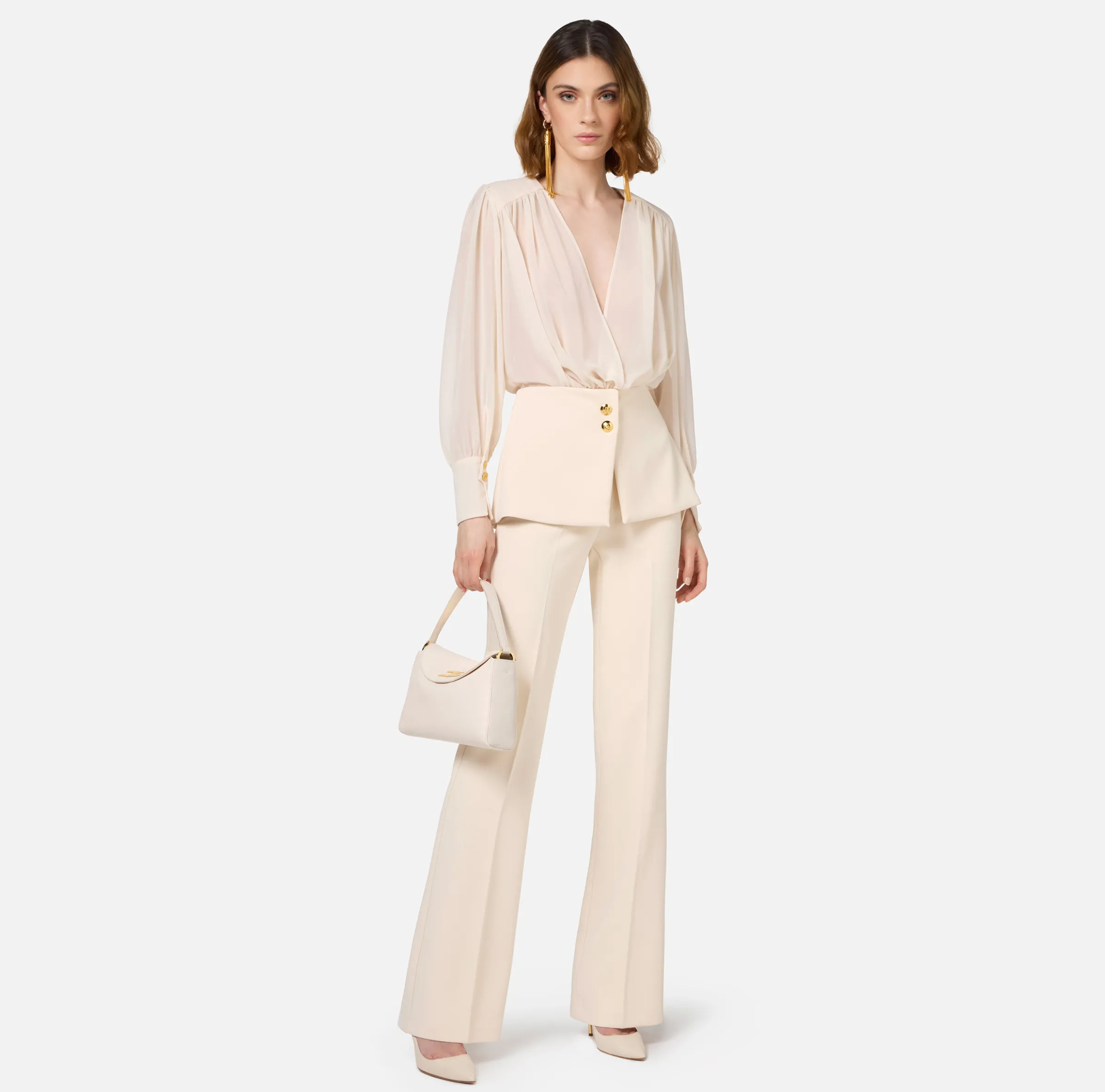 Tuta in crêpe con blusa in georgette e baschina