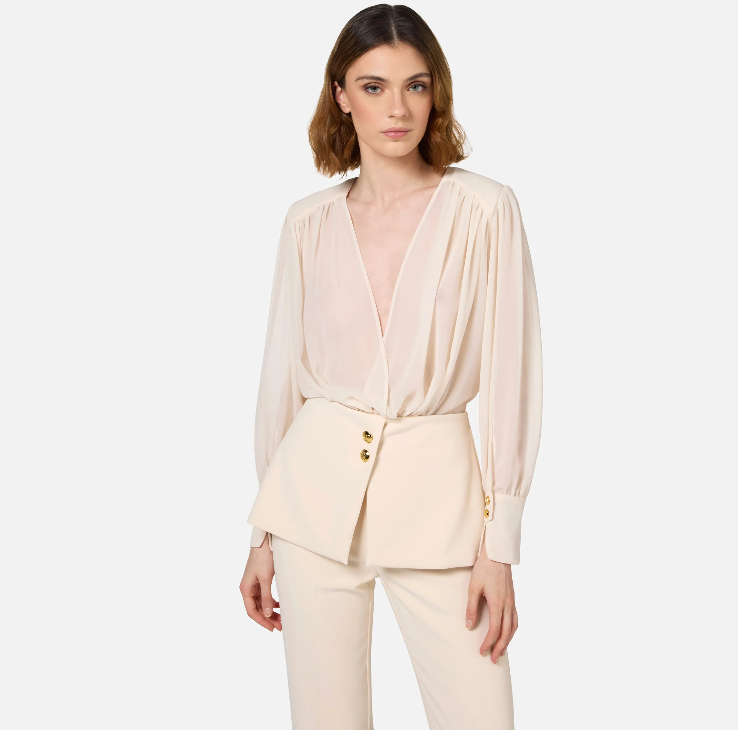 Tuta in crêpe con blusa in georgette e baschina