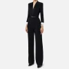 Tuta in crêpe stretch con revers in raso