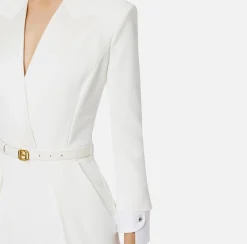 Tuta in crêpe stretch con revers in raso