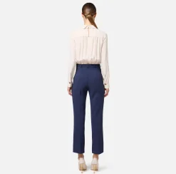 Tuta in crêpe stretch con fiocco