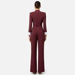 Tuta in crêpe stretch con revers in raso