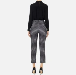 Tuta in crêpe stretch stampa rombo con fiocco
