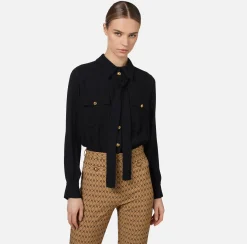 Tuta in crêpe stretch stampa rombo con fiocco