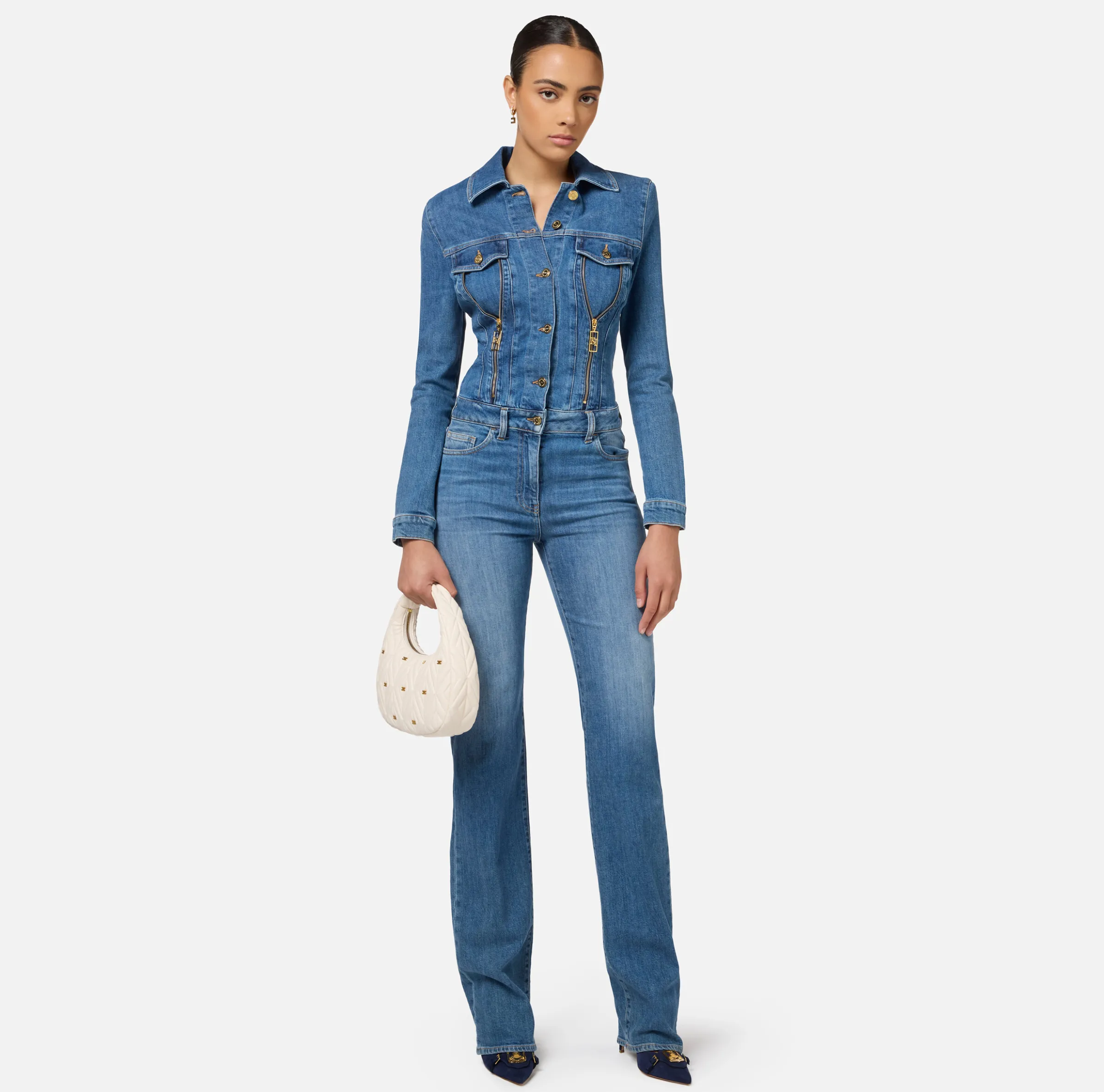 Tuta in denim con zip e spalline