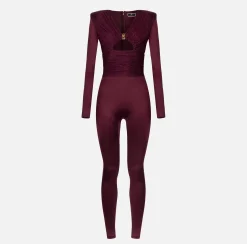 Tuta in lycra lucida con inserti plissé