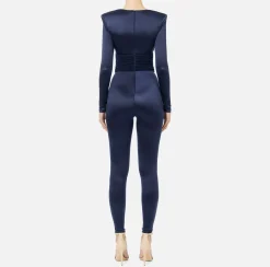 Tuta in lycra lucida con inserti plissé