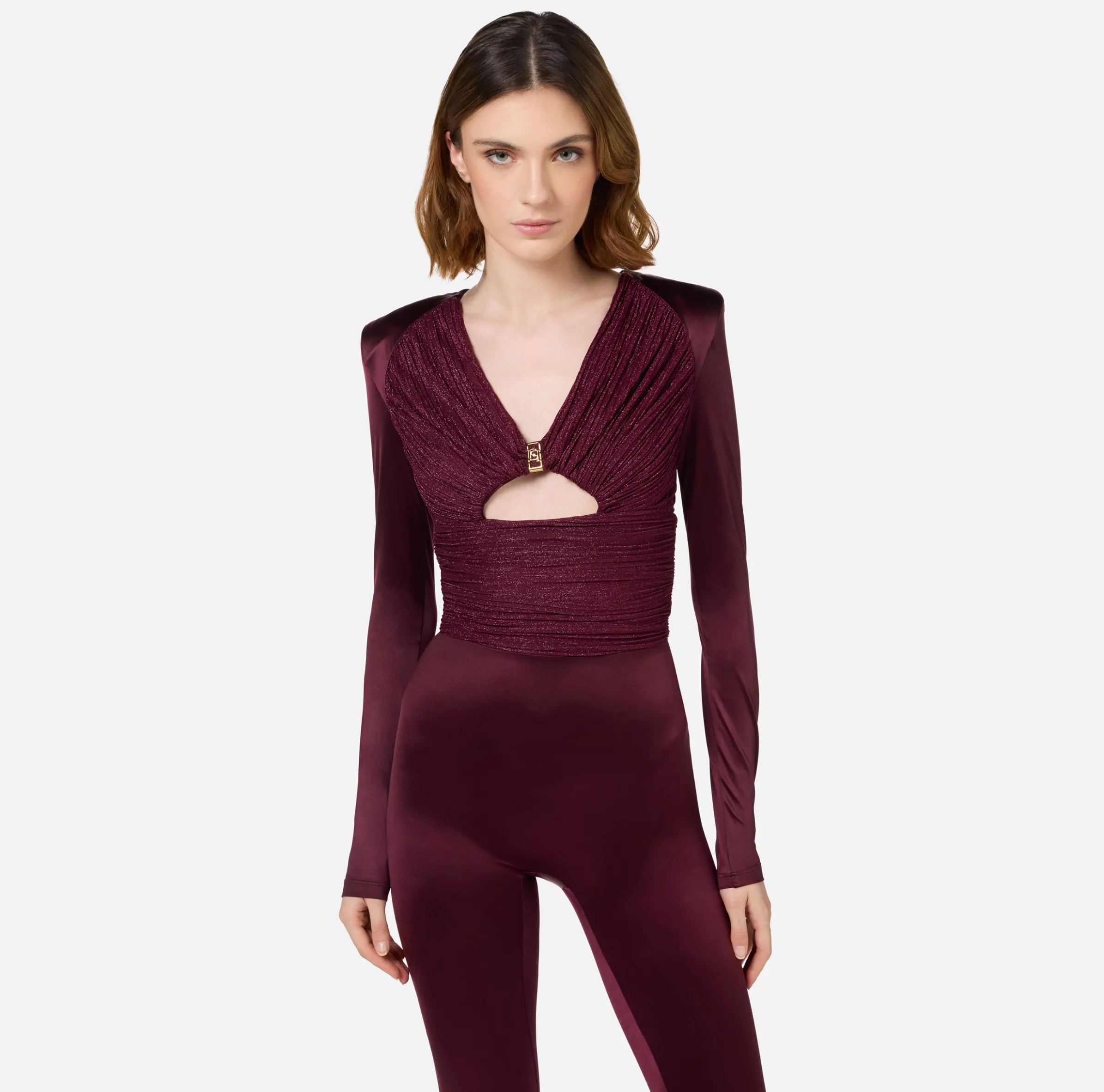 Tuta in lycra lucida con inserti plissé