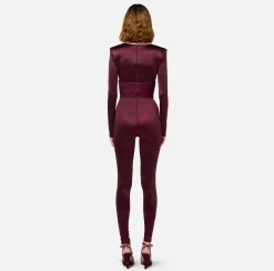 Tuta in lycra lucida con inserti plissé