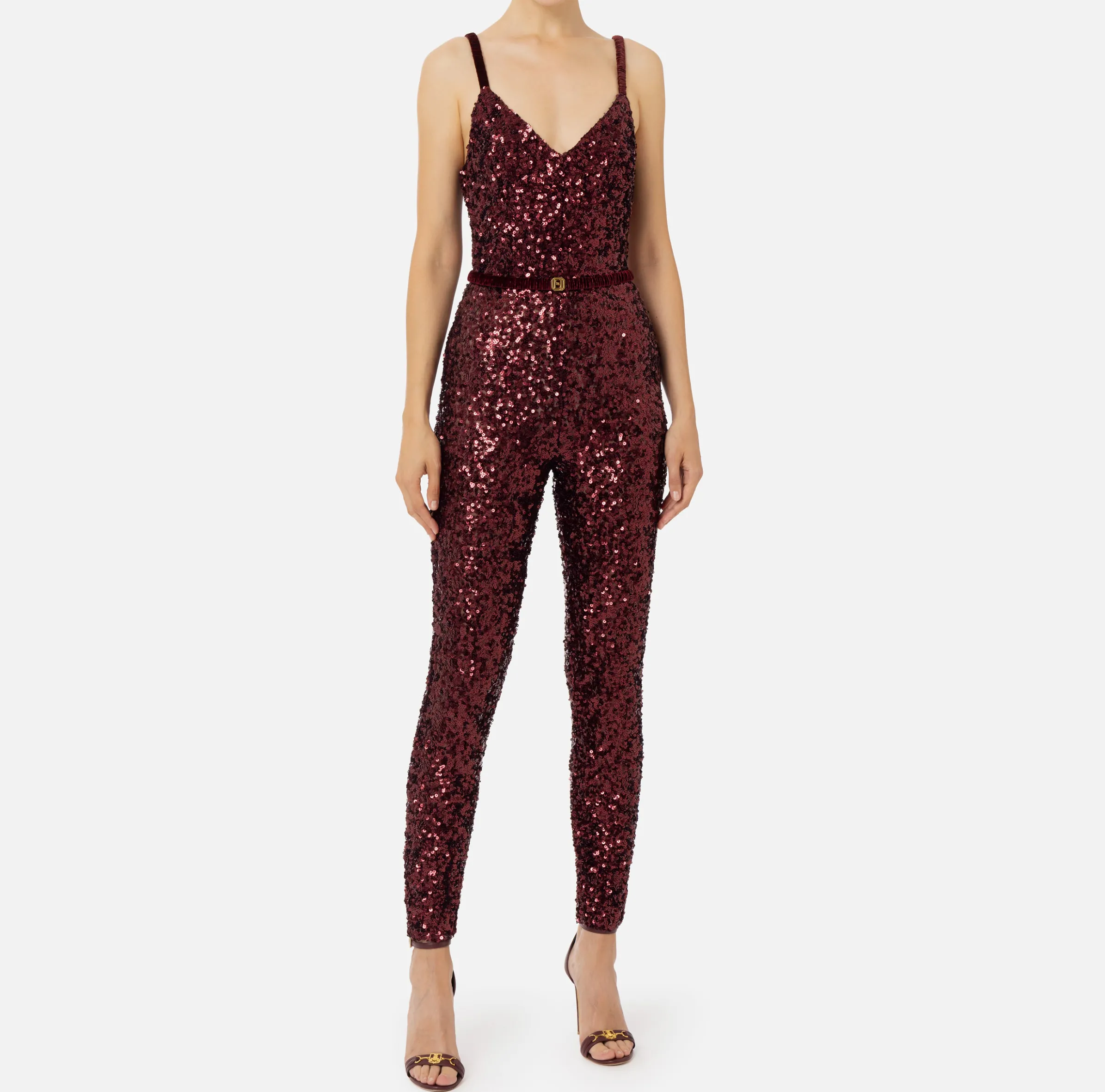 Tuta in paillettes con cintura