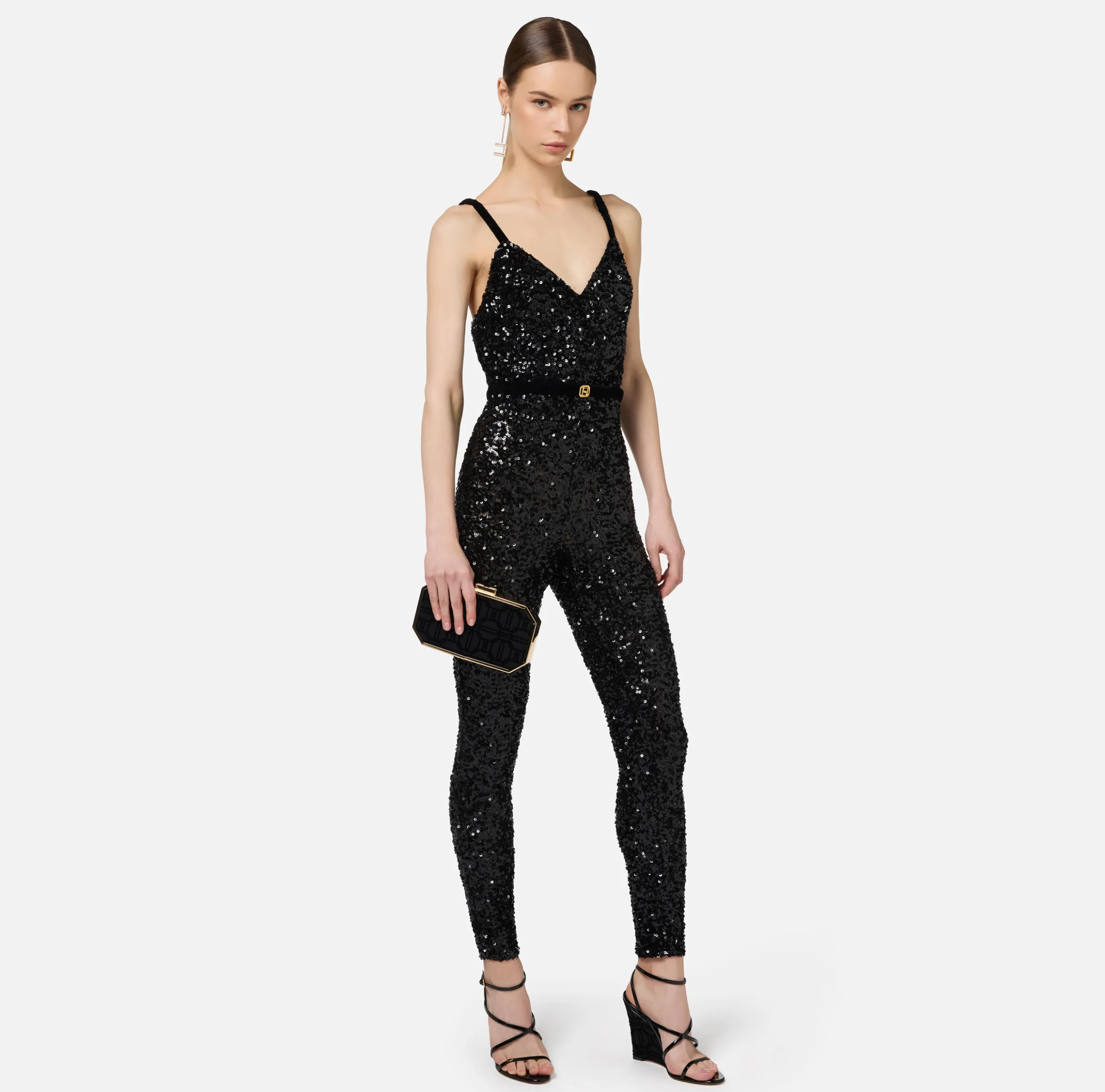 Tuta in paillettes con cintura