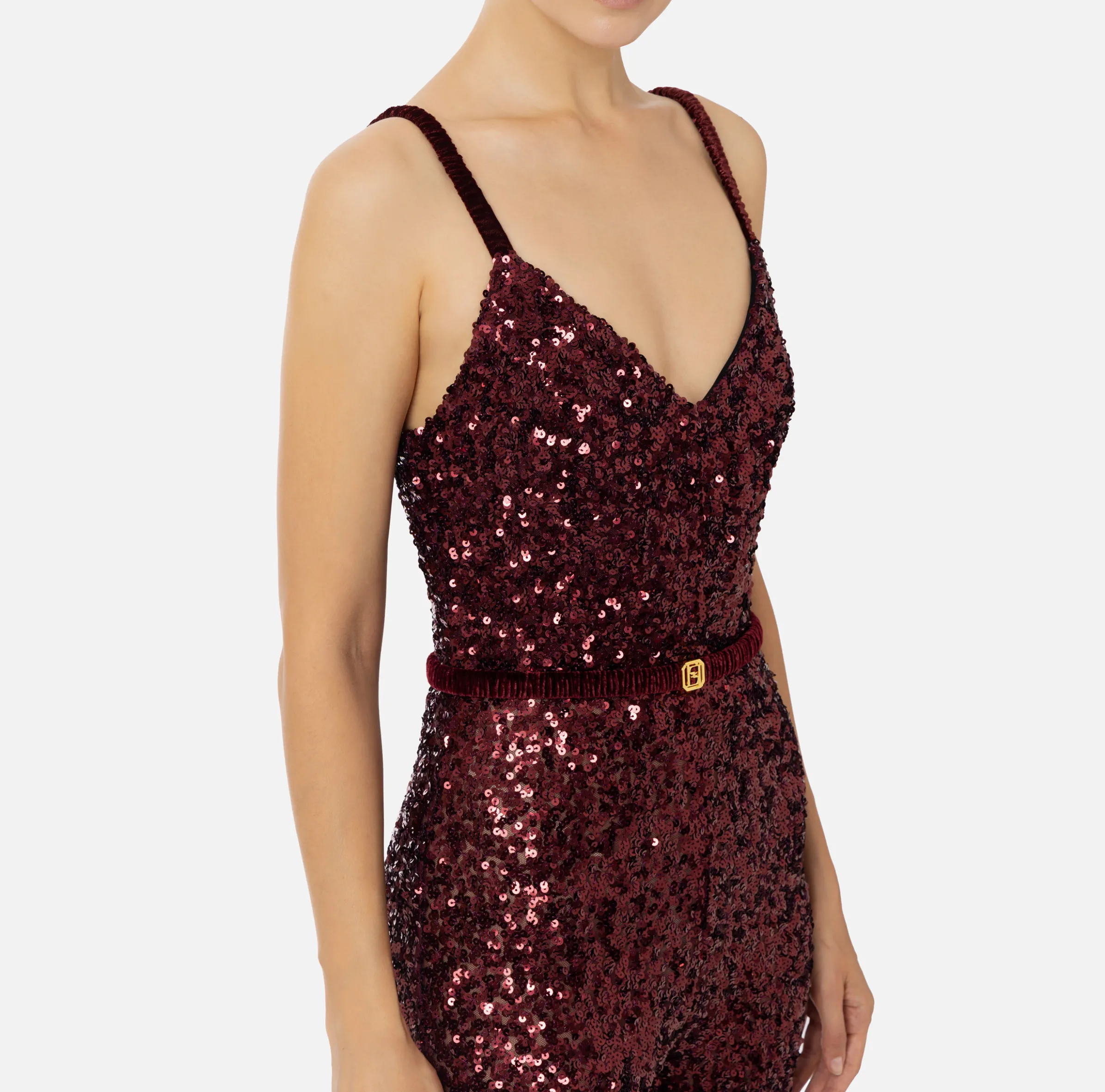 Tuta in paillettes con cintura