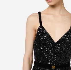 Tuta in paillettes con cintura