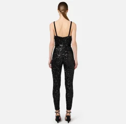 Tuta in paillettes con cintura