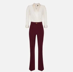 Tuta in viscosa con camicia incrociata e pantalone svasato con morsetto